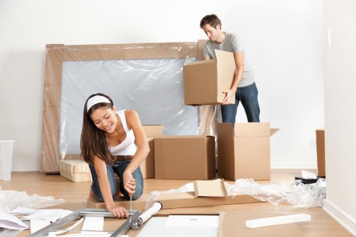 Moving van loading boxes from a Coneyhall property