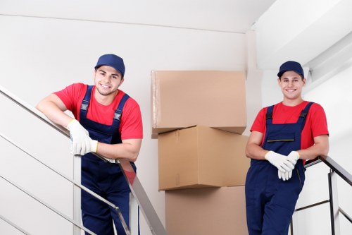 Moving team using safety equipment during a house move in Coneyhall