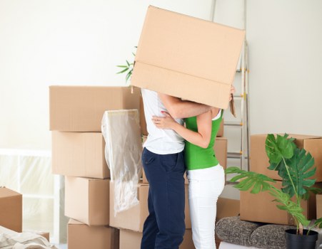 Furniture and boxes arranged for a cubic-yard quote