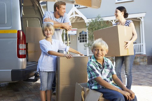 Packed office equipment and furniture ready for transport